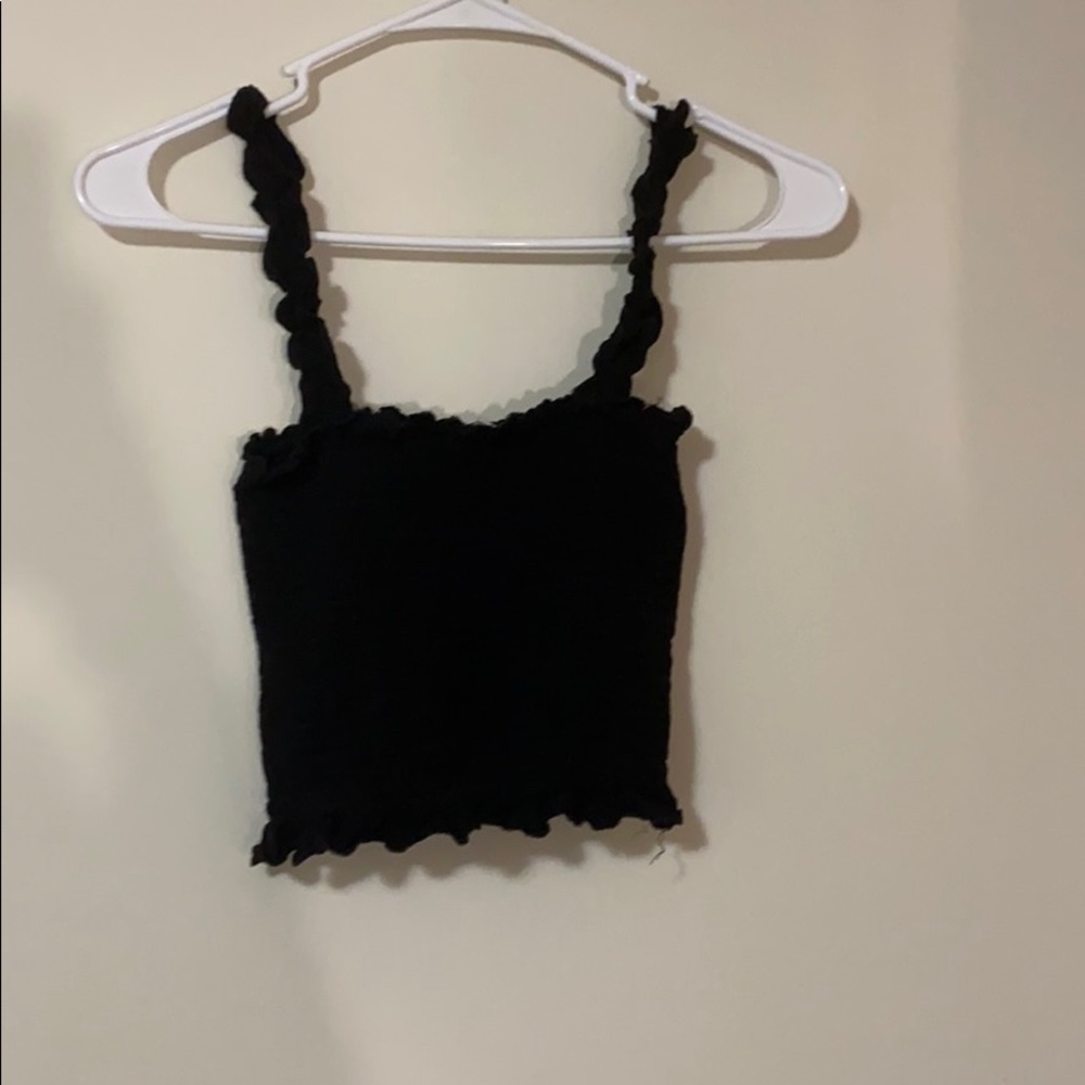 I am selling this black cropped tank top.